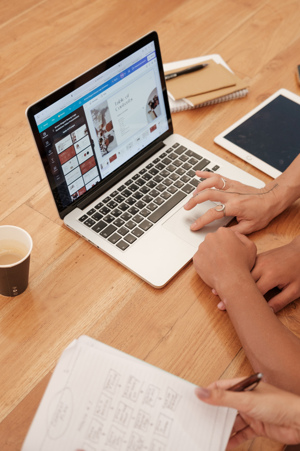 Colleagues Working Together with a Laptop